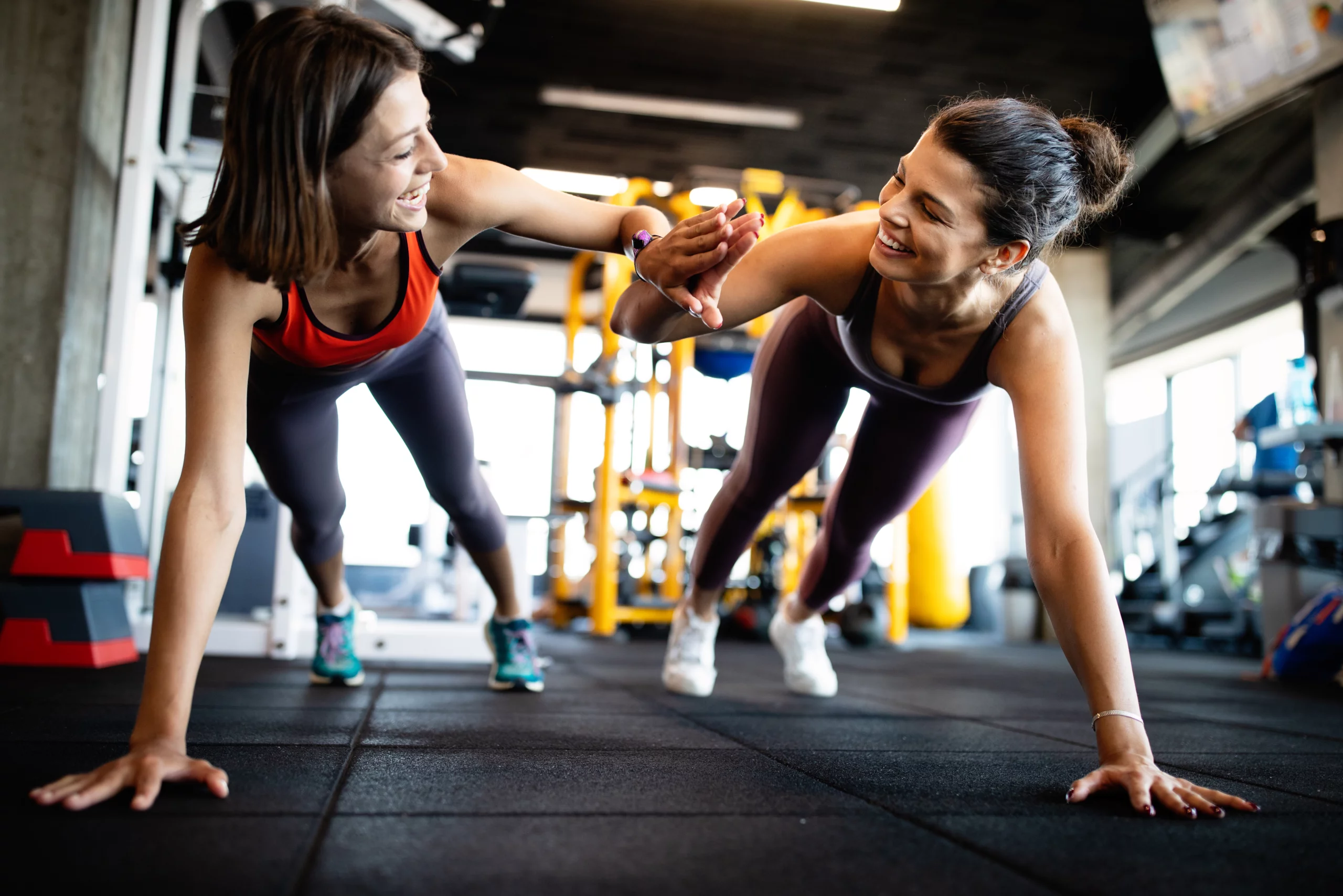 beautiful fit women working out in gym 2021 08 28 07 03 43 utc scaled 1 10 tips to help you stay motivated over winter! 1