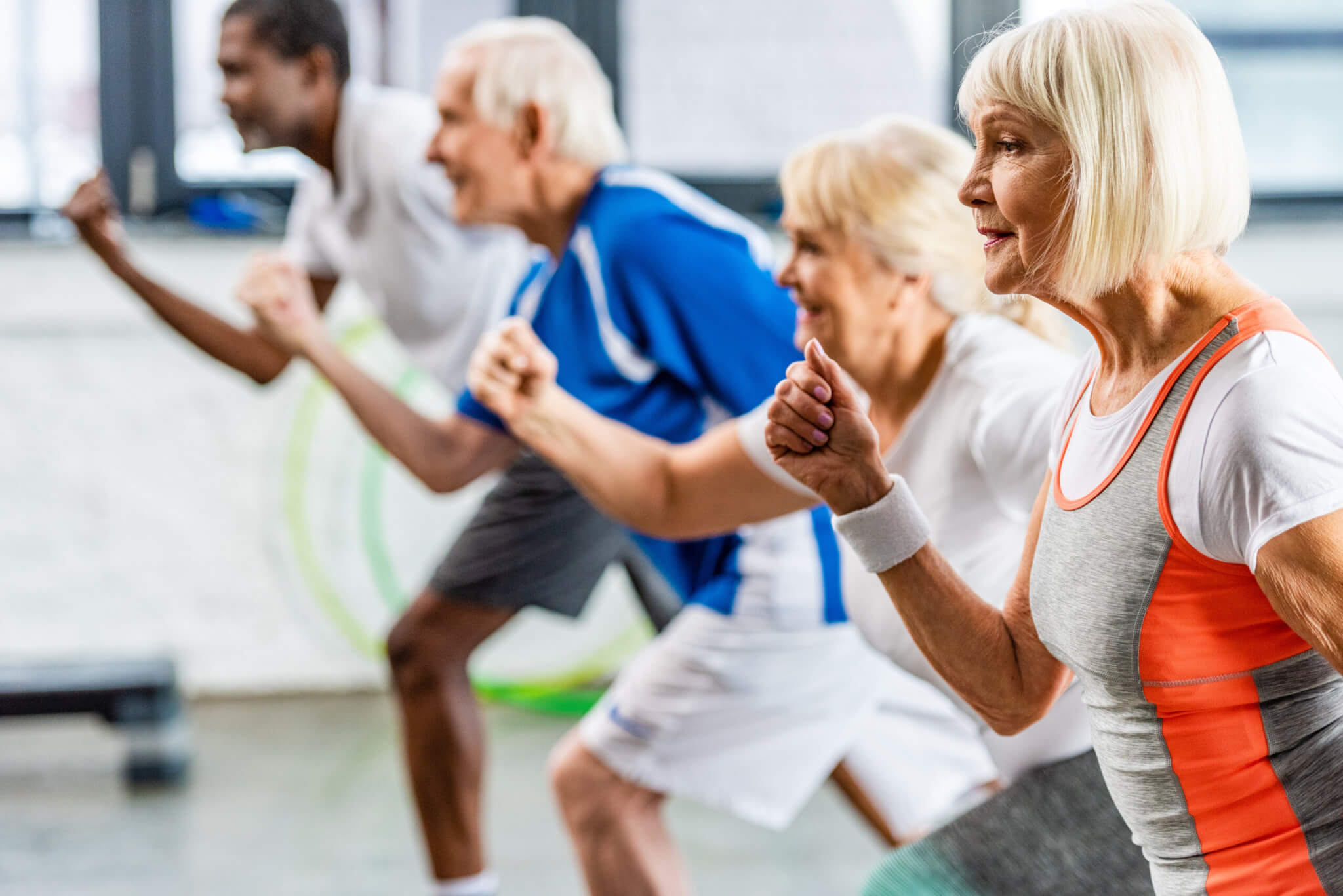 selective focus of senior sportswoman exercising w 2023 11 27 05 27 01 utc scaled 1 Active Ages 3