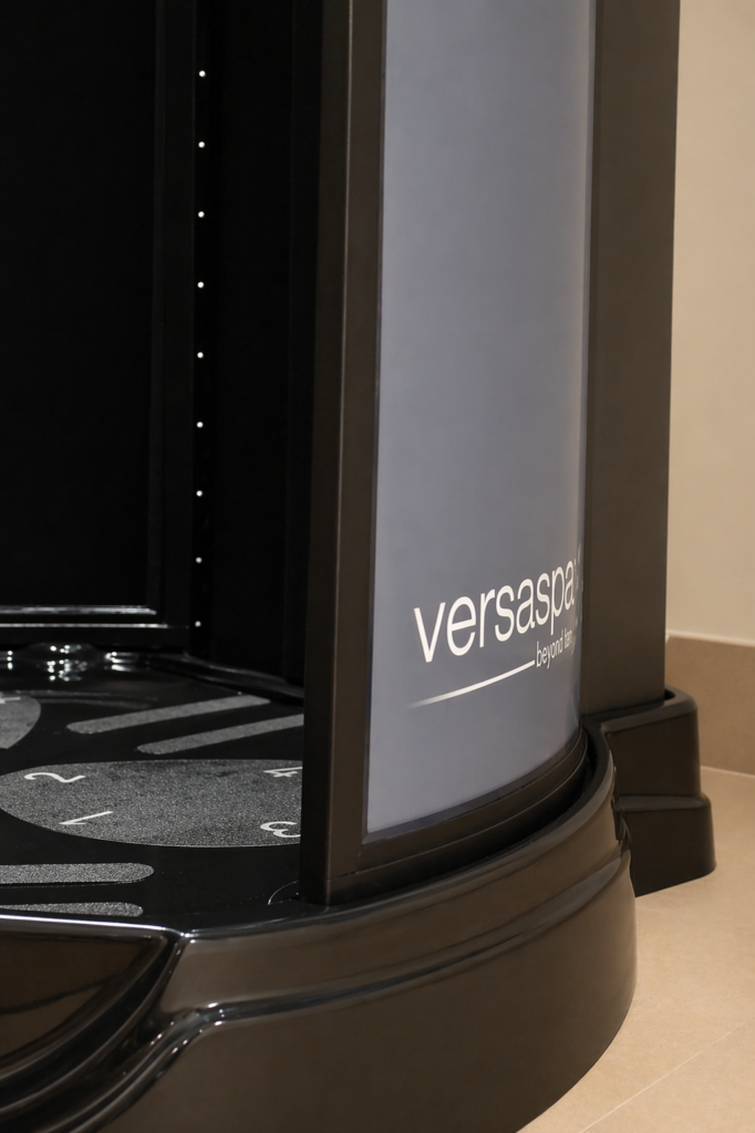 Close-up of VersaSpa spray tanning booth base and foot placement area