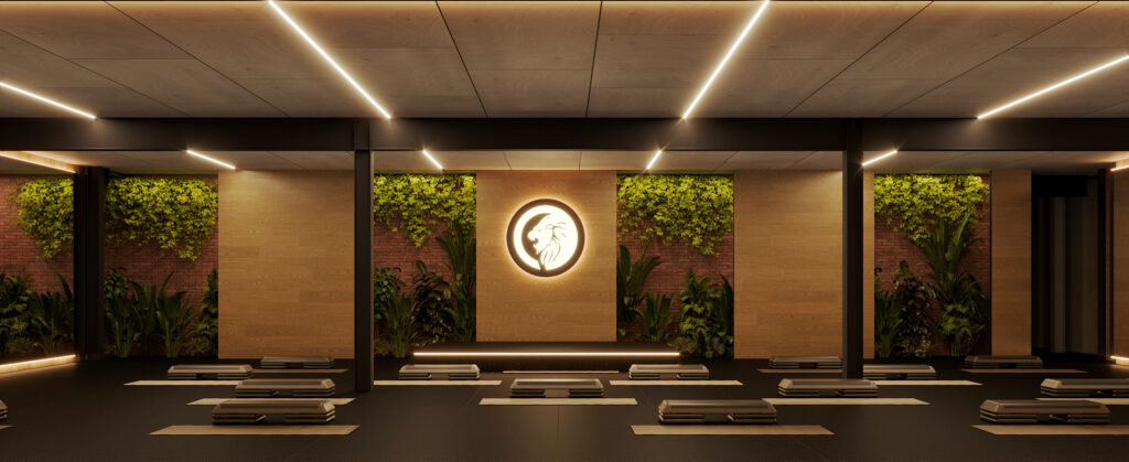 Render of ROAR Active Bibra Lake’s new group fitness room featuring timber walls, soft LED lighting, instructor stage and neatly spaced mats and steps.