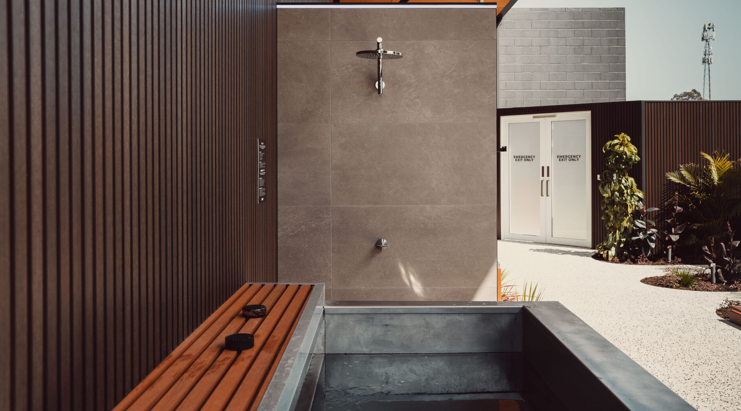 Outdoor ice bath and shower at The Oasis, ROAR Active Bibra Lake