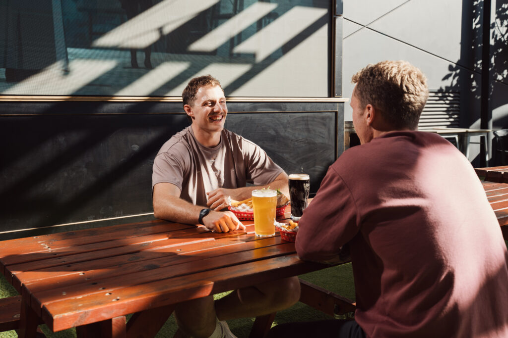 Two guys having lunch at ROAR Bar and Grill on the WA Day public holiday